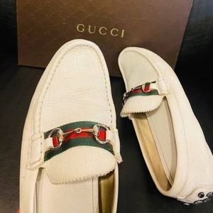 Men’s white Gucci leather horse belt loafers